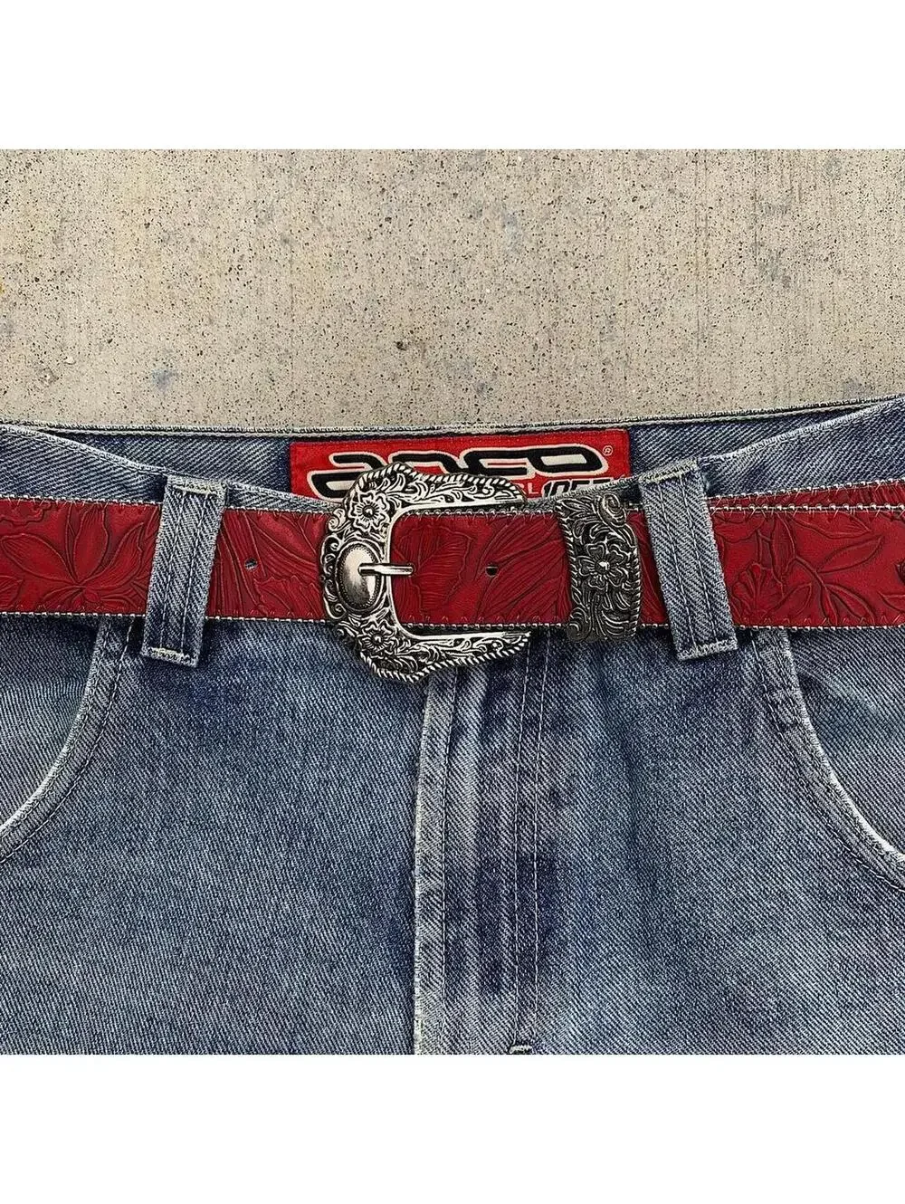 Red Western Floral belt with silver belt buckle. 38 inches length